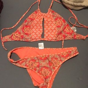 Orange two piece bandana print bathing suit
